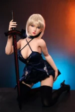 Busty blonde fantasy sex doll kneeling in warrior dress